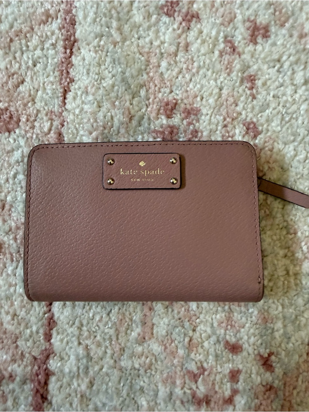 kate spade mauve leather zip card holder with gold-tone logo